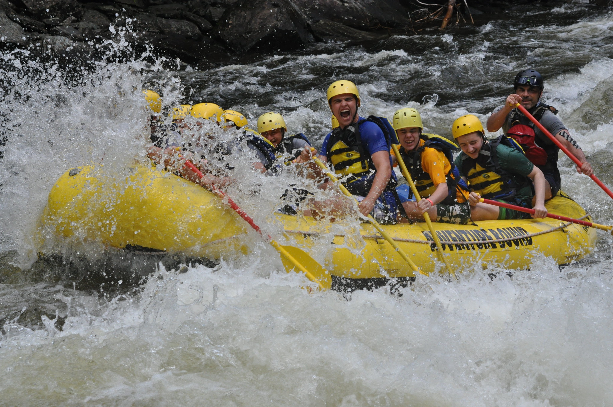 People enjoying white water rafting