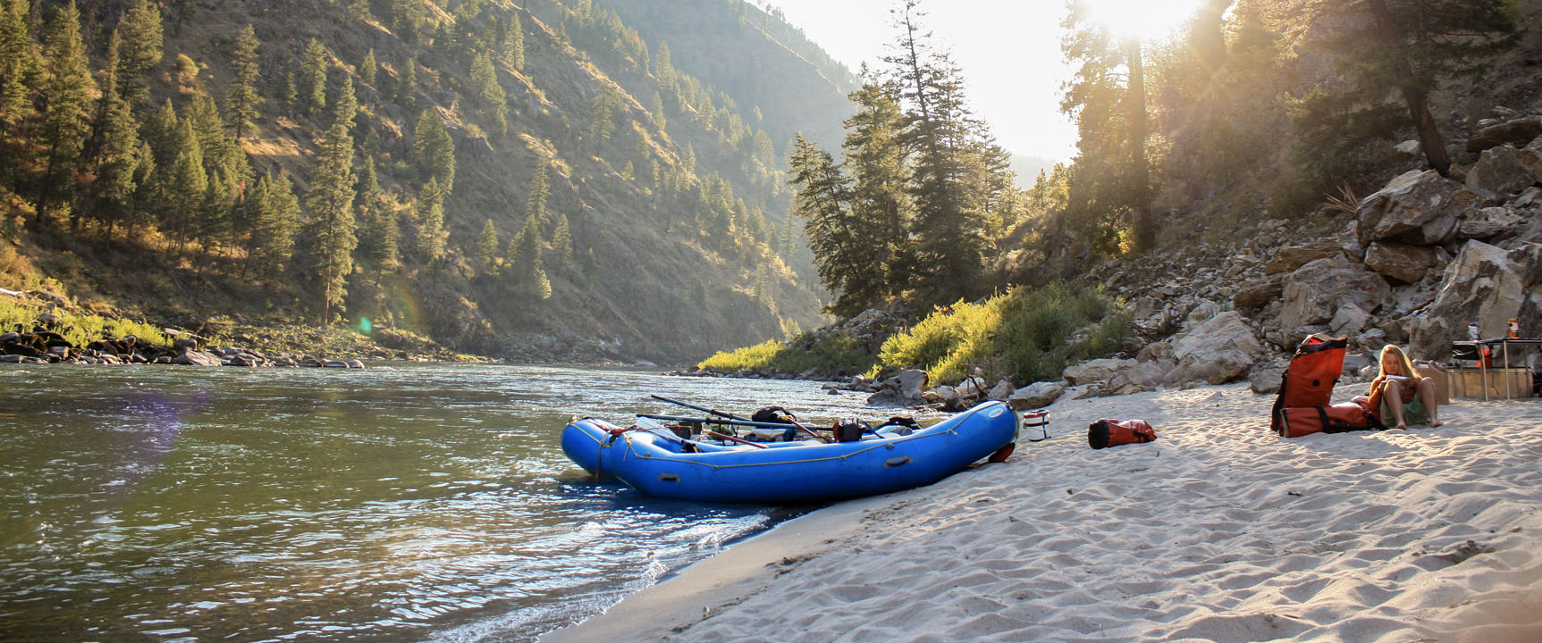 inflatable raft on the shore of a river